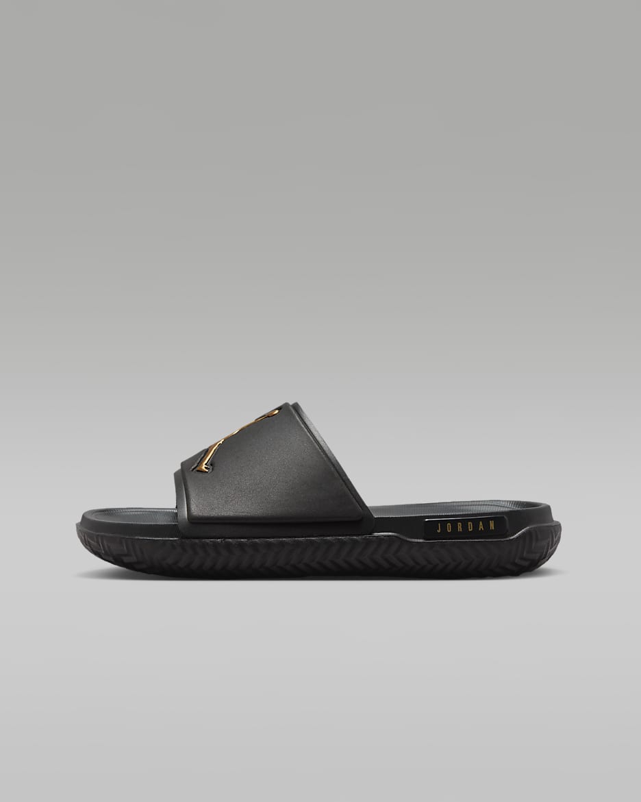 Black and gold jordan sandals top